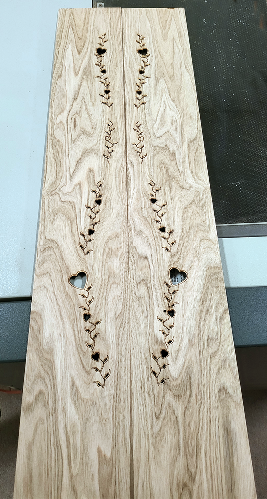 a trailing sound hole design for a future folkcraft dulcimer top