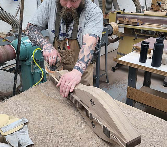 cheyenne sanding a folkcraft dulcimer