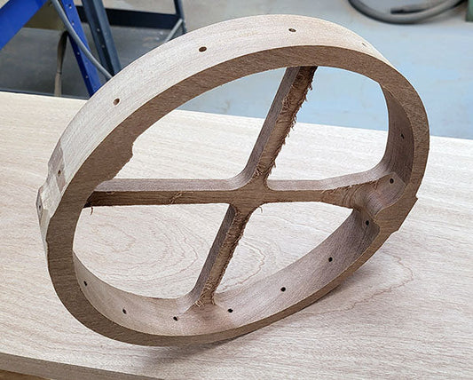 a folkcraft lap-jo rim made from a solid slab of mahogany