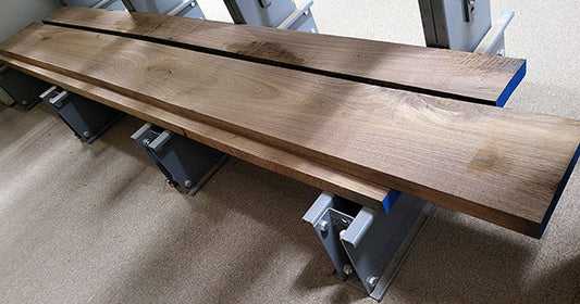 10 foot planks of black walnut in the Folkcraft woodshop