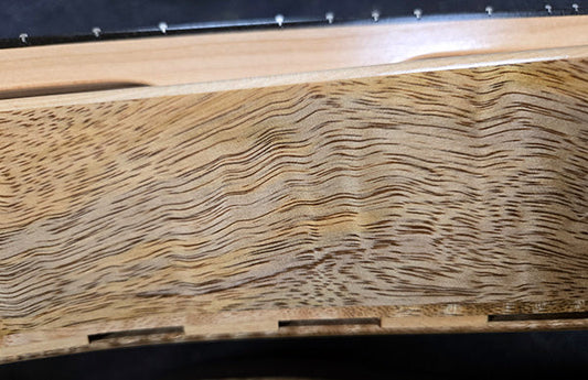 side view of a folkcraft mango wood dulcimer under construction