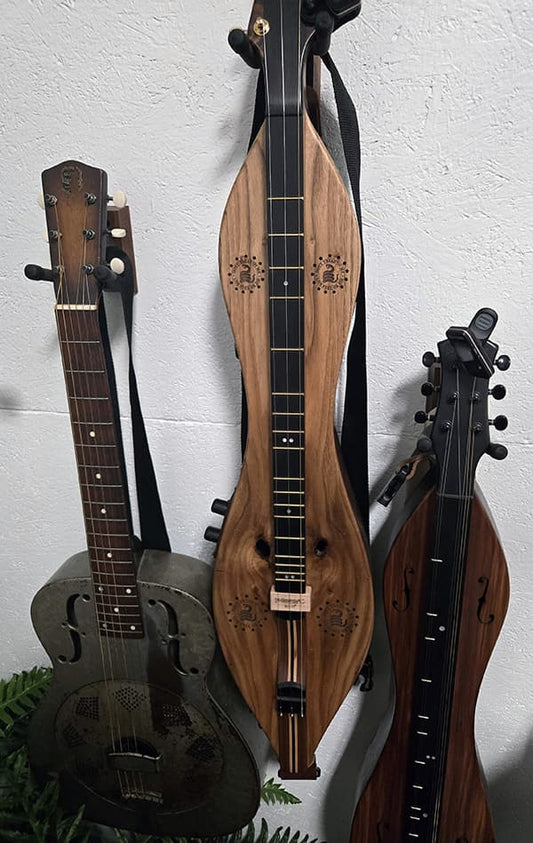 Fishman onboard pickup which we installed on a teardrop padauk/spruce dulcimer this week
