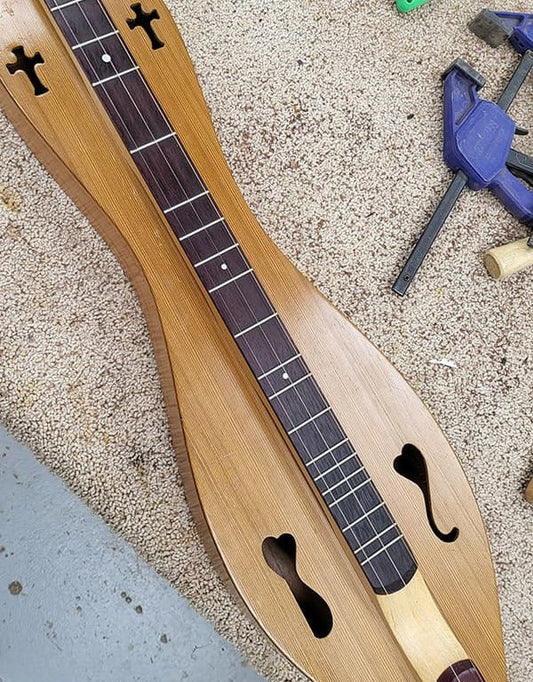 Folkcraft dulcimer in the shop for sound hole repair - circa 2023