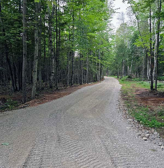 gravel driveway from the new Folkcraft shop parking lot