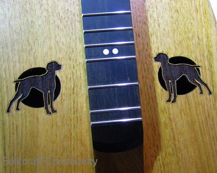 Dog Tone Holes, Embroidered Cases & Gold Frets