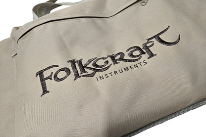 Dulcimer carrying case, tan, embroidered Folkcraft Instruments logo, logo detail